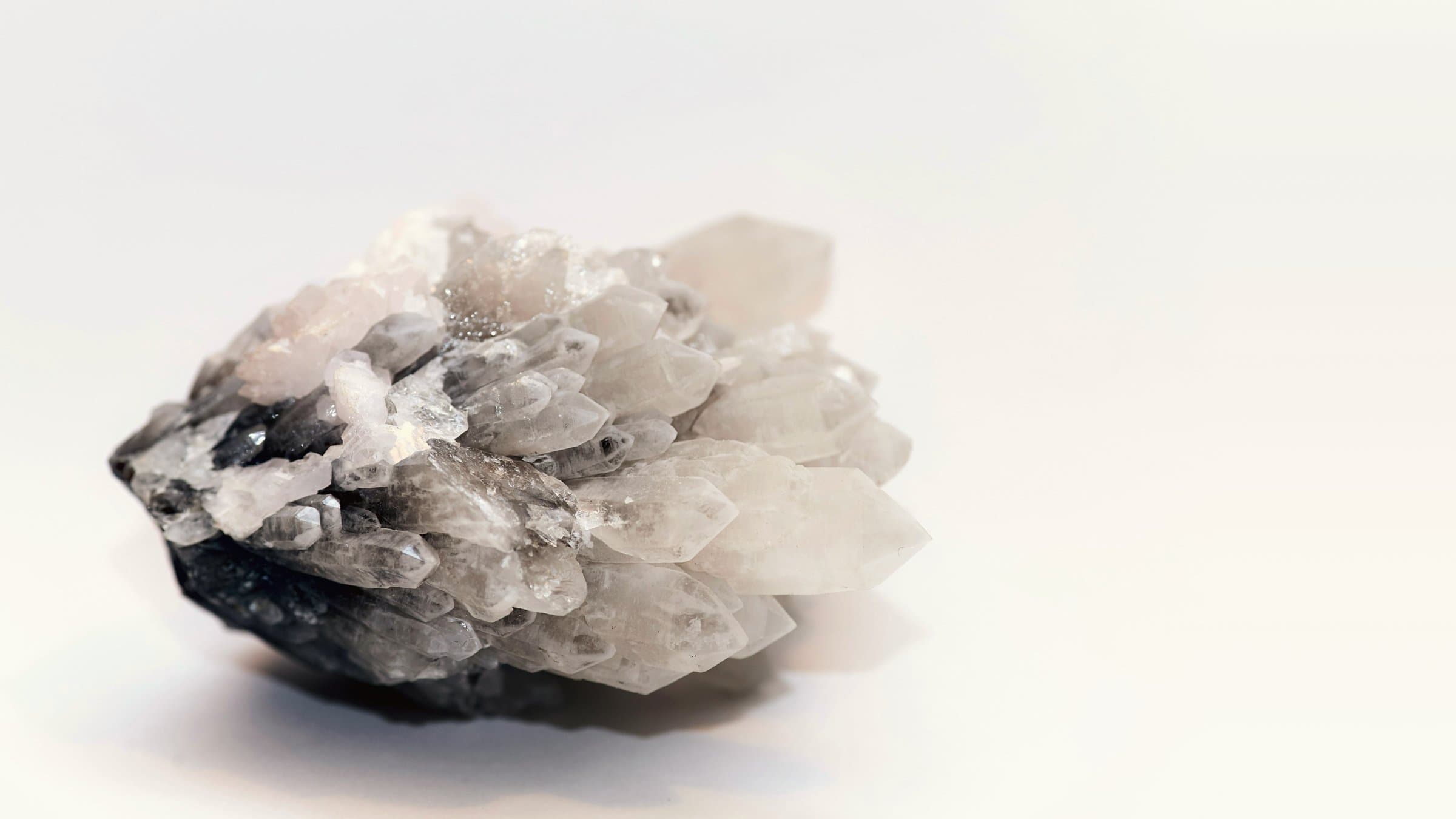 Clear quartz crystals in bright, airy light